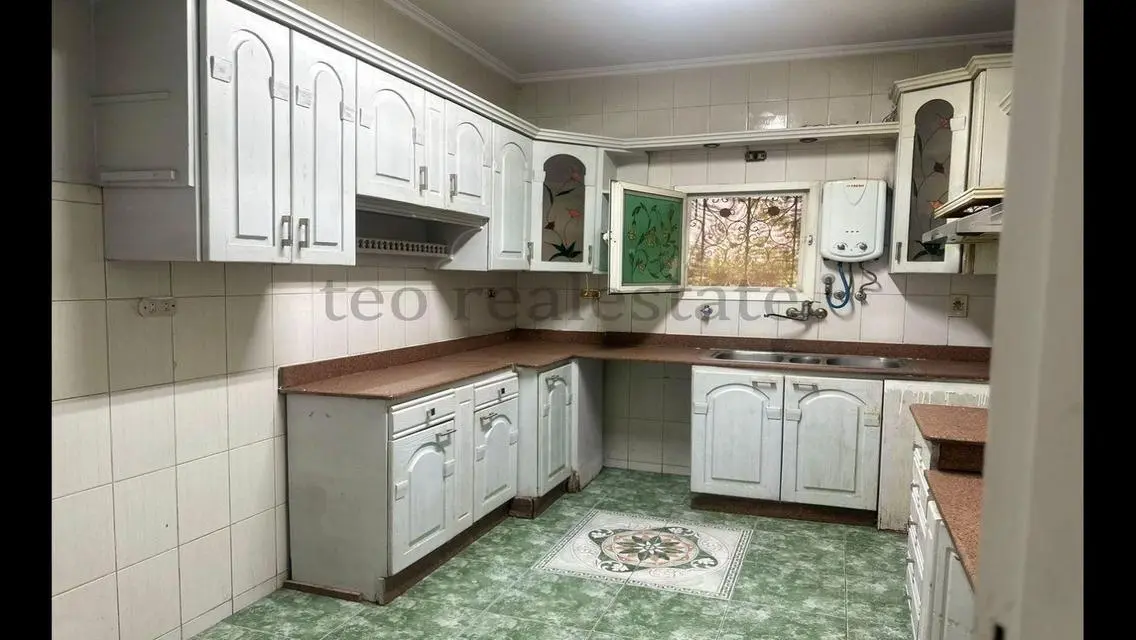 Luxurious Property with Private Garden and Maid's Room in Prime Location