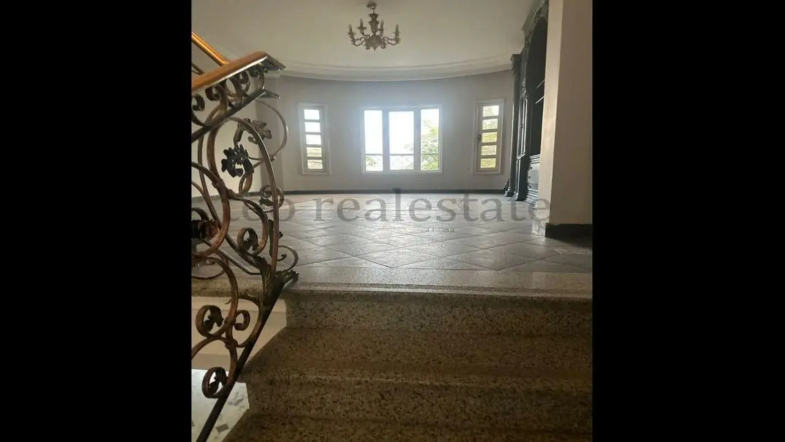 Luxurious Property with Private Garden and Maid's Room in Prime Location
