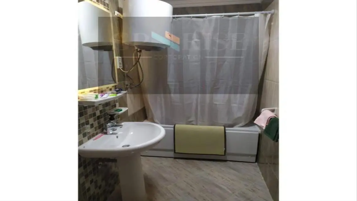 Luxury Apartment with Private Balcony and Pool in Central Location