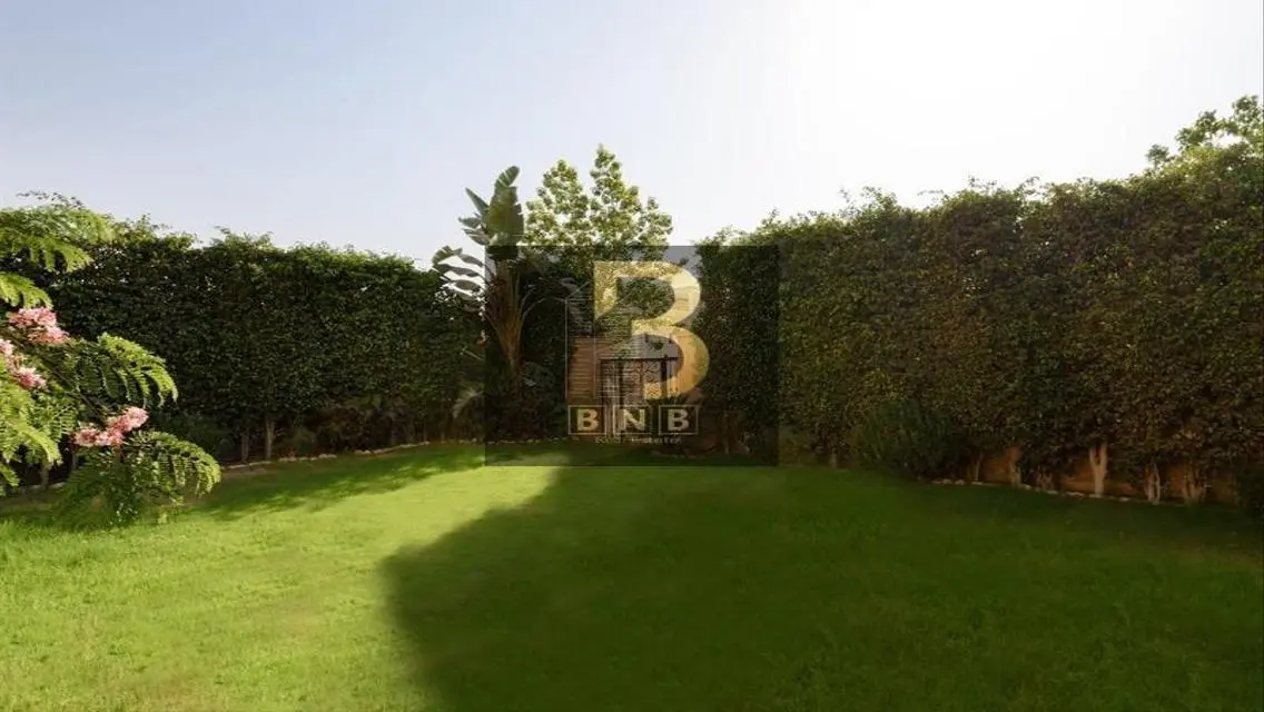 Luxurious 3-Bedroom Apartment with Private Garden and Shared Pool
