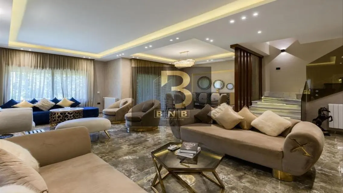 Luxurious 3-Bedroom Apartment with Private Garden and Shared Pool