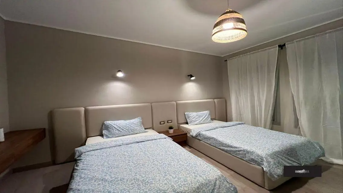 Luxurious Two-Bedroom Apartment with Study Room in Entertainment Area