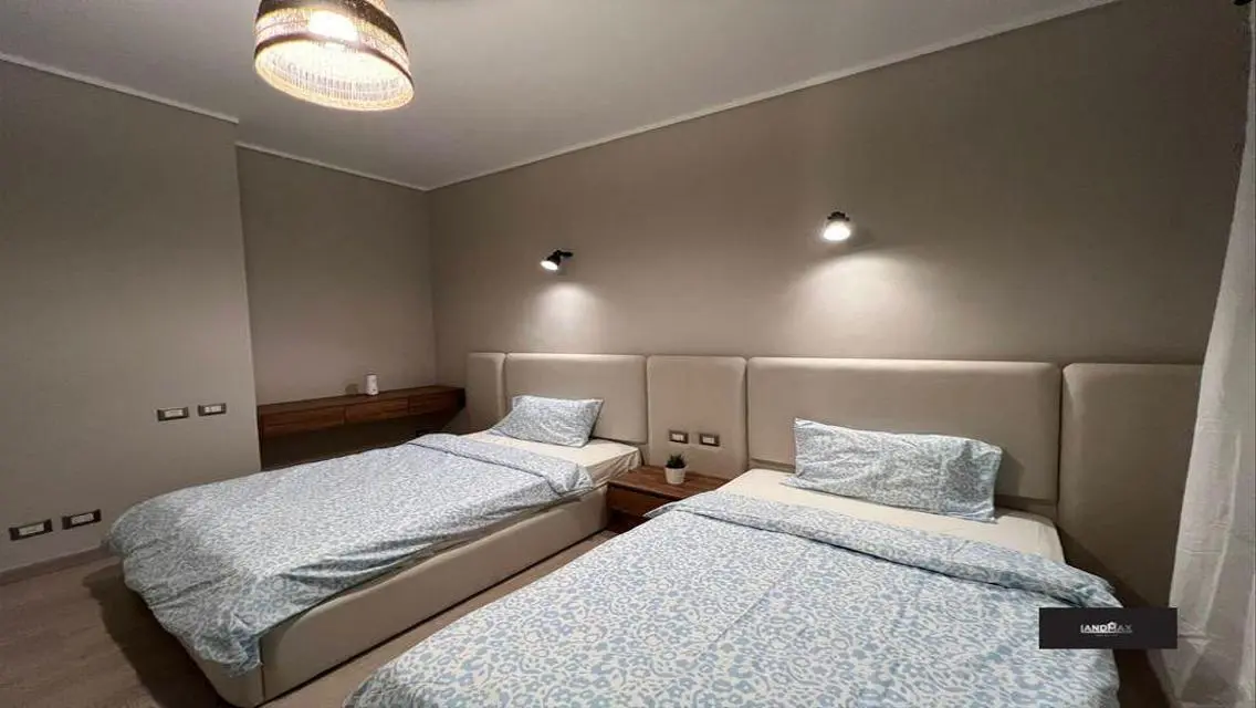 Luxurious Two-Bedroom Apartment with Study Room in Entertainment Area