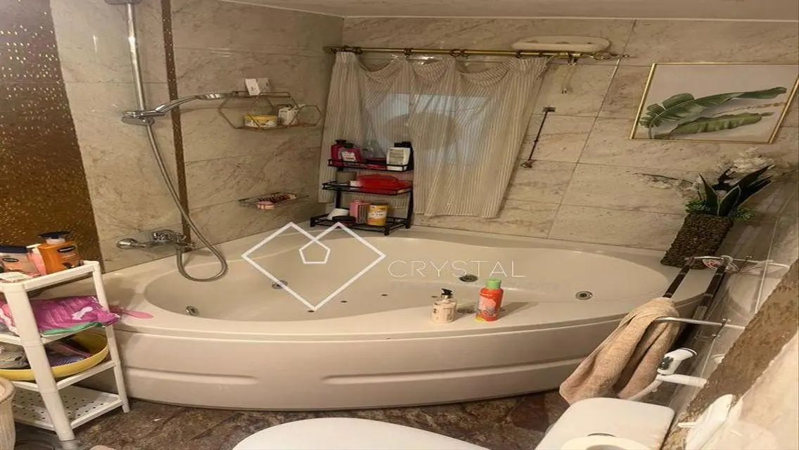 Luxurious Apartment with Private Garden in Prime Location