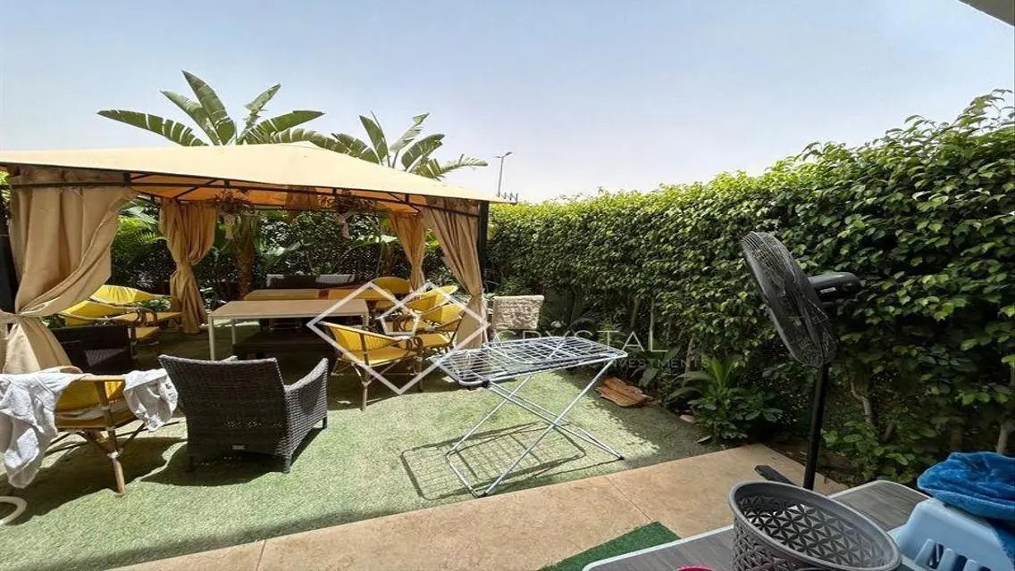 Luxurious Apartment with Private Garden in Prime Location