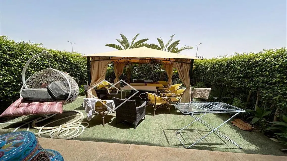 Luxurious Apartment with Private Garden in Prime Location