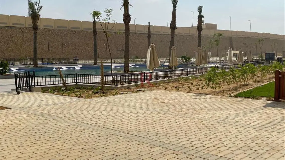 Luxurious Home with Private Garden and Shared Pool for Sale