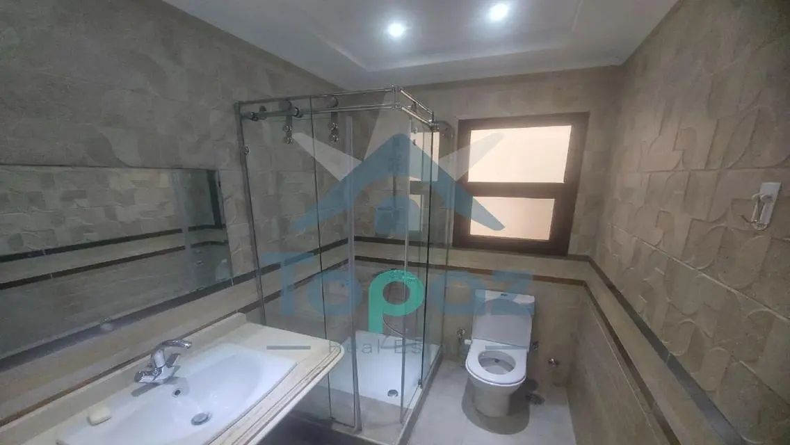 Charming Apartment with Private Garden and Security Guard