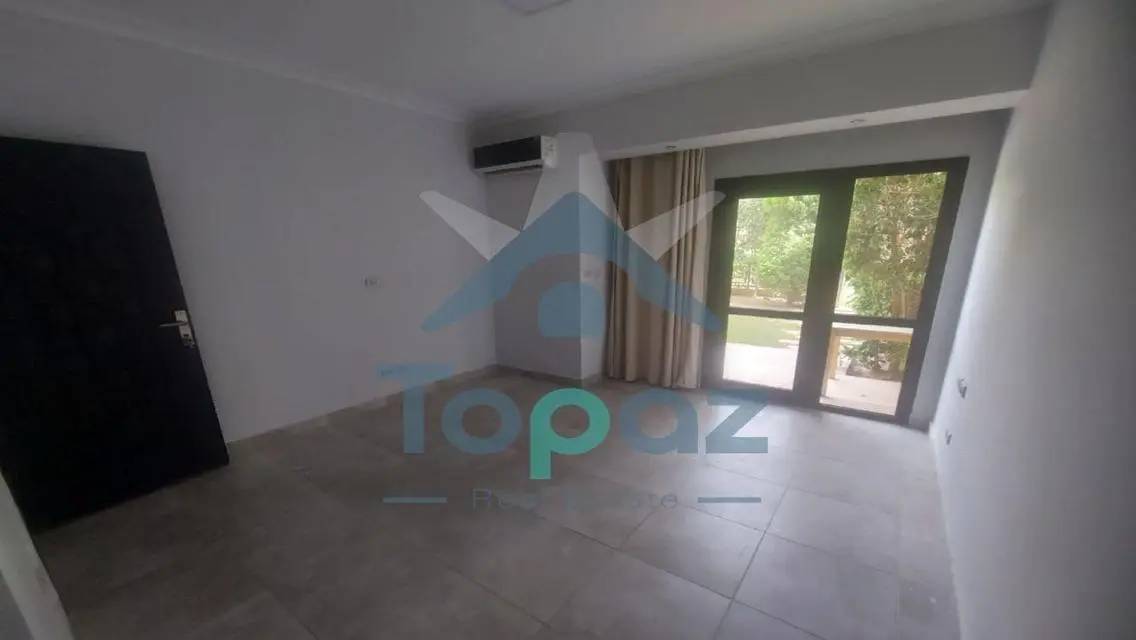 Charming Apartment with Private Garden and Security Guard