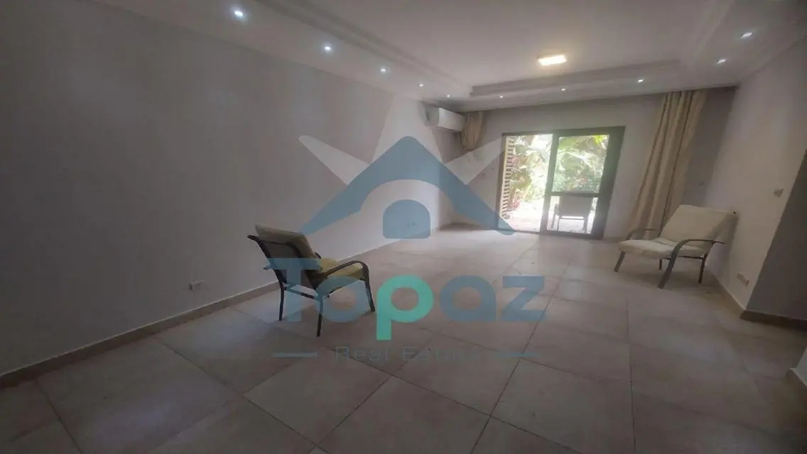 Charming Apartment with Private Garden and Security Guard