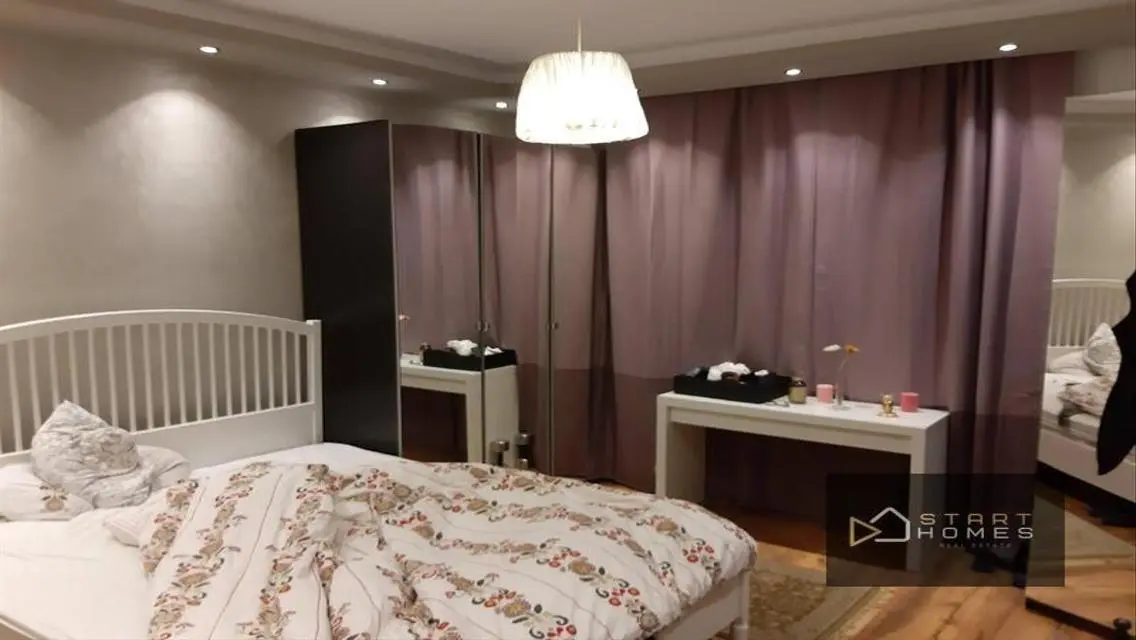 Stunning Apartment with Balcony and Security Guard in Prime Location
