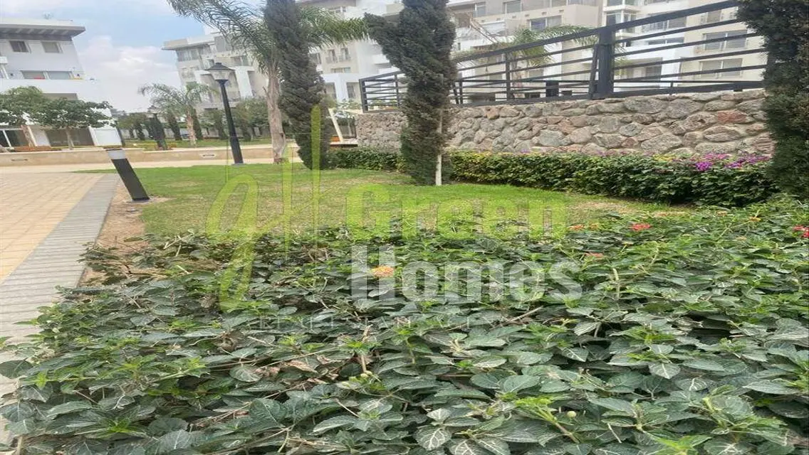 Green Home for Sale with Security Guard