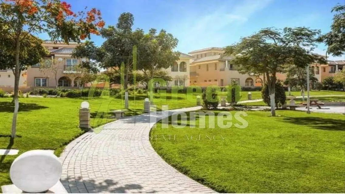 Modern Green Home for Sale with Security Guard