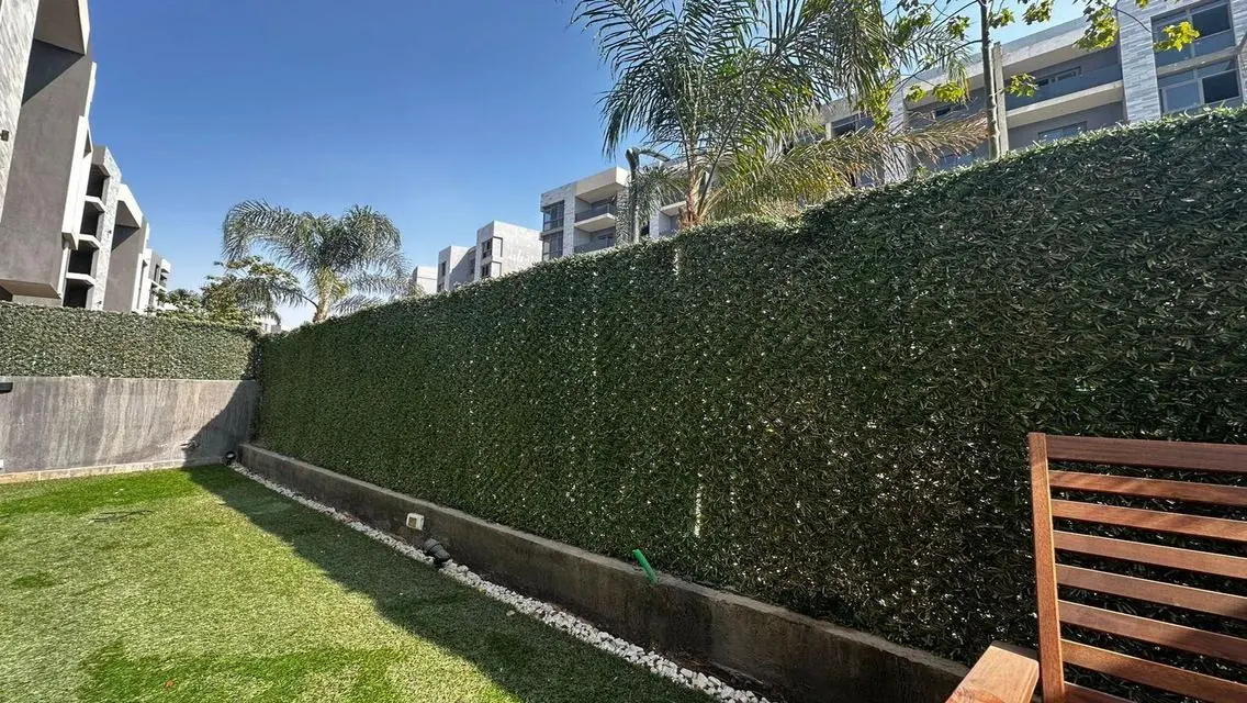 Luxury Apartment with Private Garden and Shared Pool in Prime Location