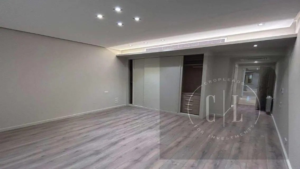 Luxury Apartment with Private Garden and Shared Pool for Sale