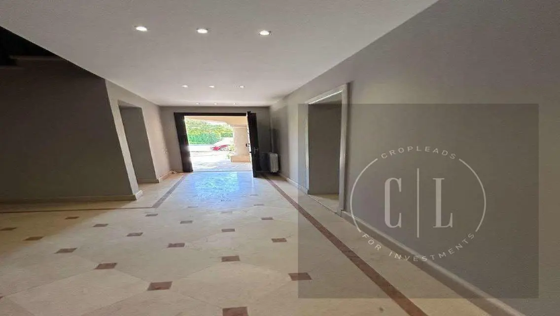 Luxury Apartment with Private Garden and Shared Pool for Sale