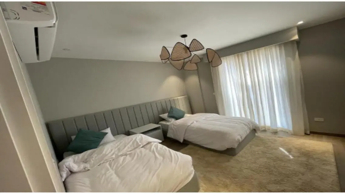 Luxury Apartment in 15-164 with Private Garden and Shared Pool