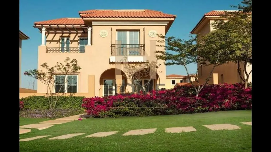 Luxurious Villa for Sale with Private Garden and Shared Pool