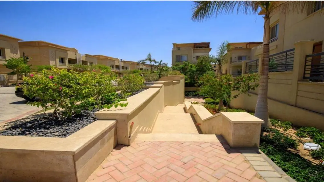 Luxury Apartment with Private Garden and Shared Pool