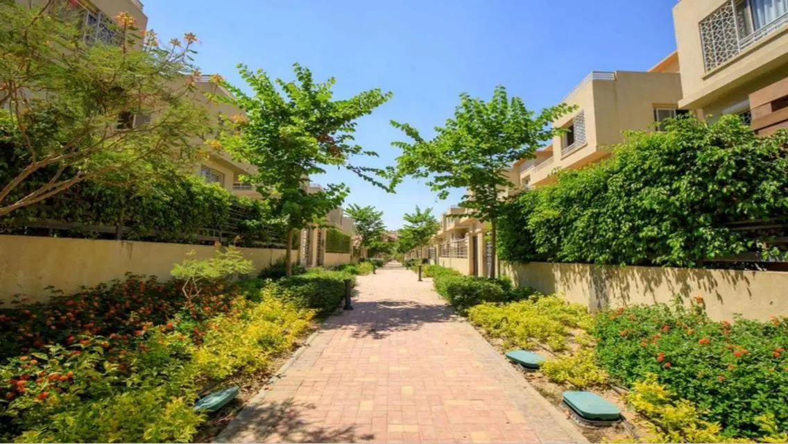 Luxury Apartment with Private Garden and Shared Pool
