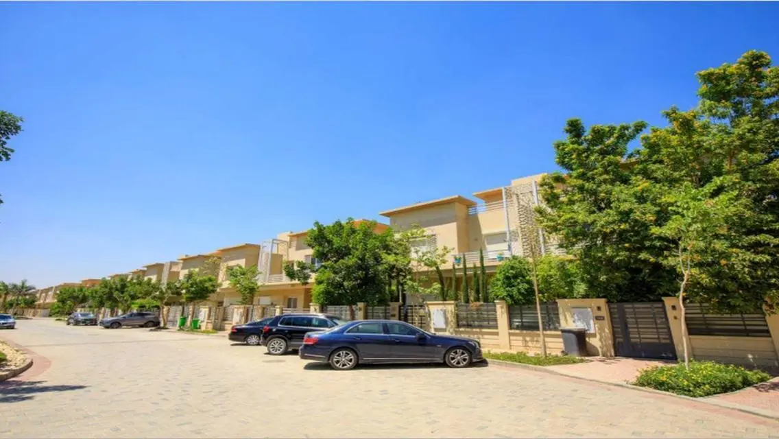Luxury Apartment with Private Garden and Shared Pool
