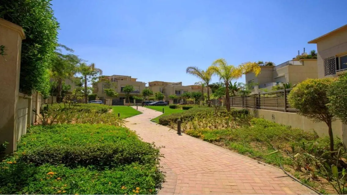 Luxury Apartment with Private Garden and Shared Pool