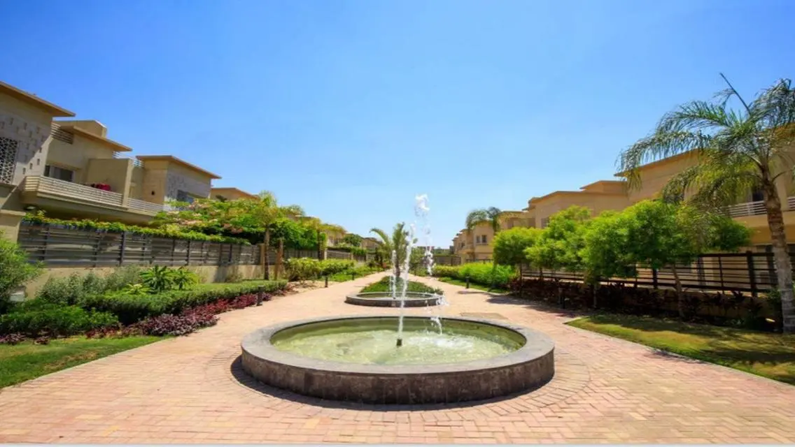 Luxury Apartment with Private Garden and Shared Pool
