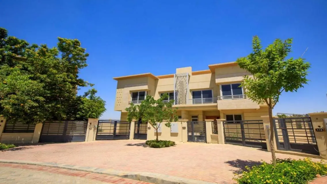 Luxury Apartment with Private Garden and Shared Pool