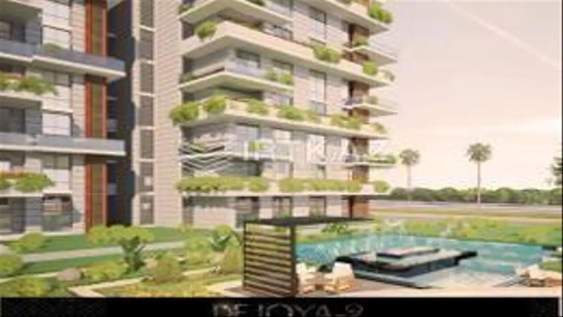 Luxury 4-Bedroom Apartment with Balcony and Shared Pool