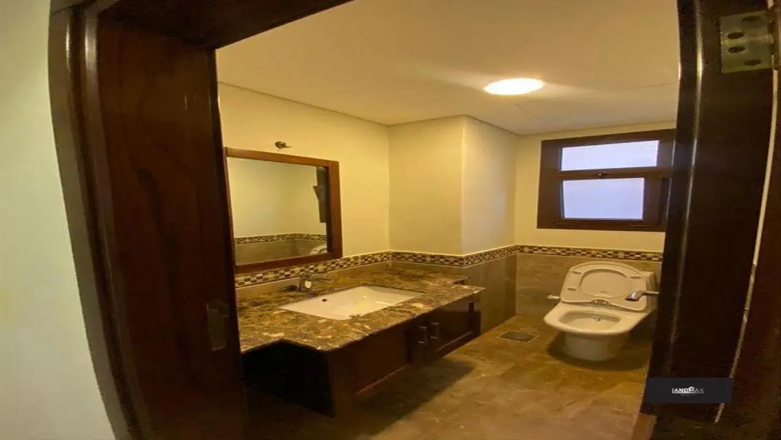 Luxurious 5-Bedroom Apartment with Pool and Private Garden