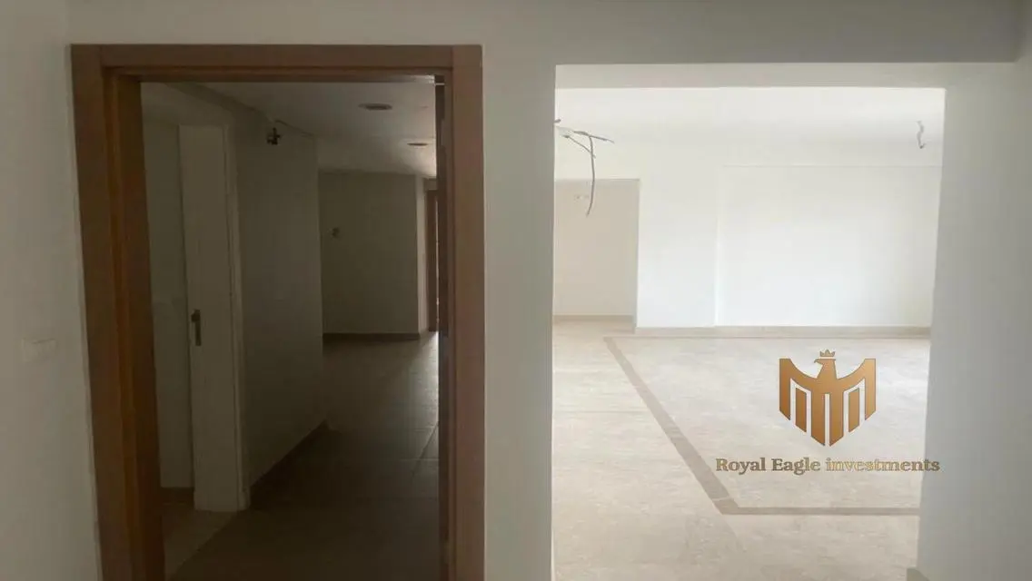 Luxurious 3-Bedroom Apartment with Maid's Room and Balcony