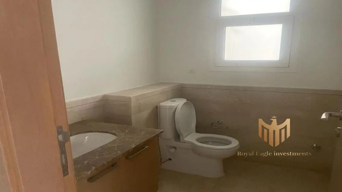 Luxurious 3-Bedroom Apartment with Maid's Room and Balcony