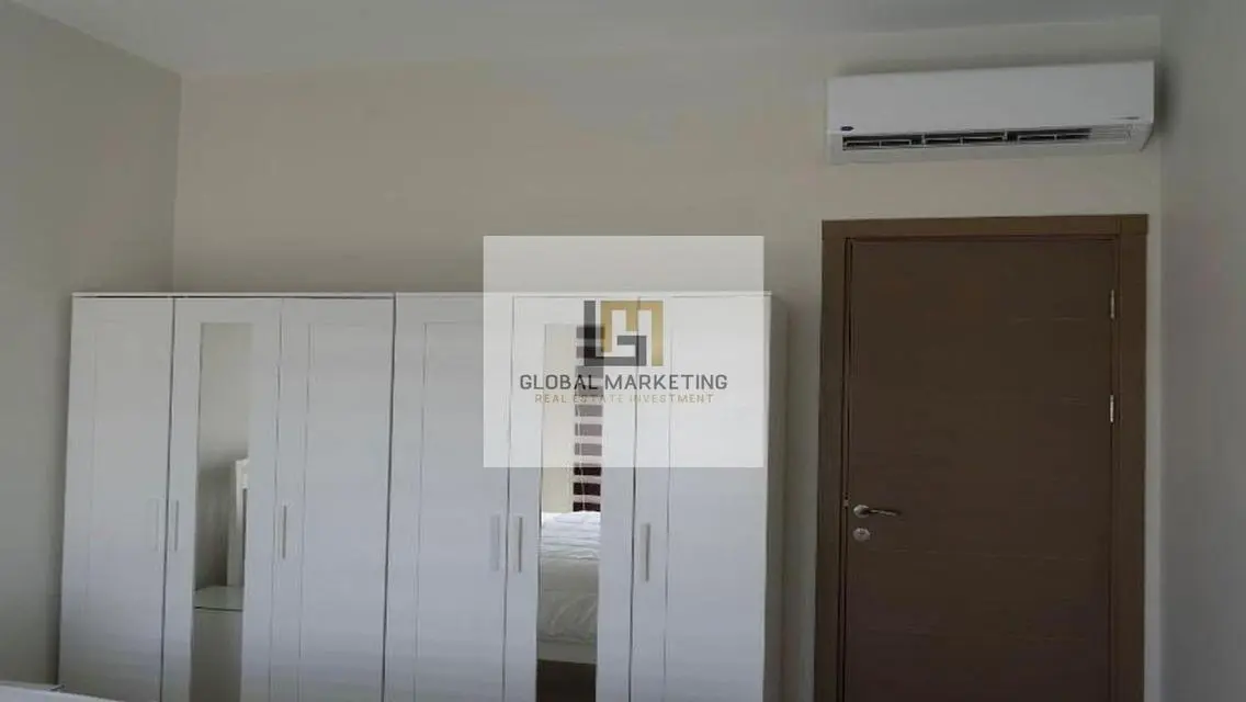 Charming Apartment with Balcony and Shared Pool for Sale