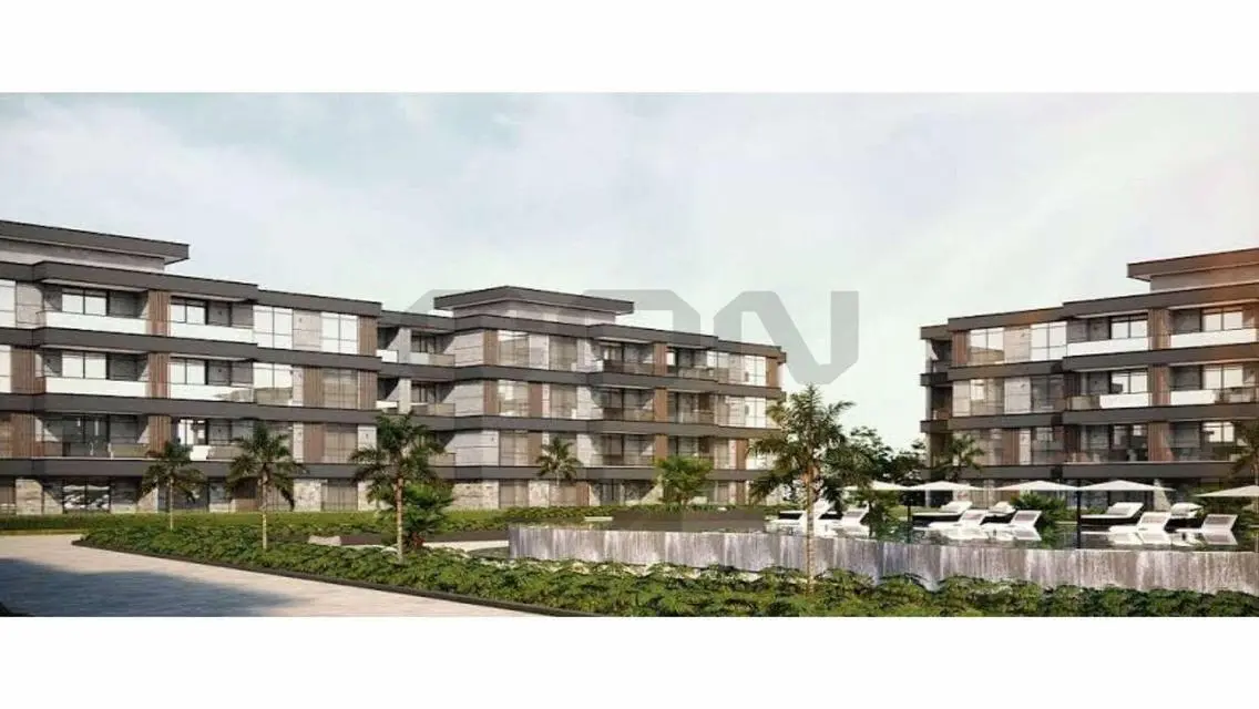 Luxury 3-Bedroom Apartment with Private Garden and Shared Pool
