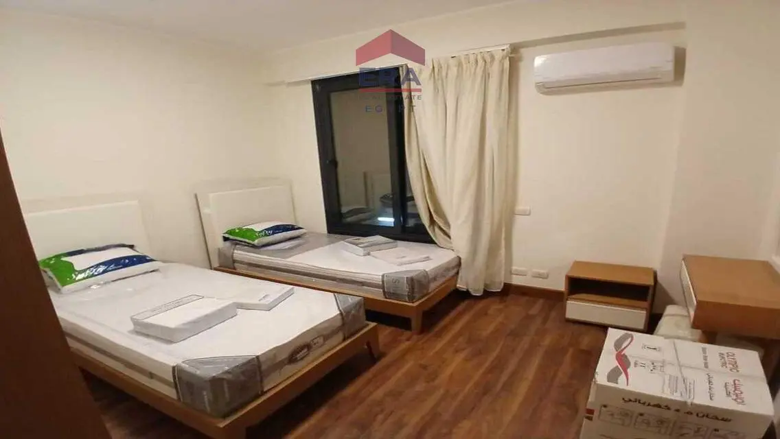 Spacious Apartment with Balcony and Covered Parking