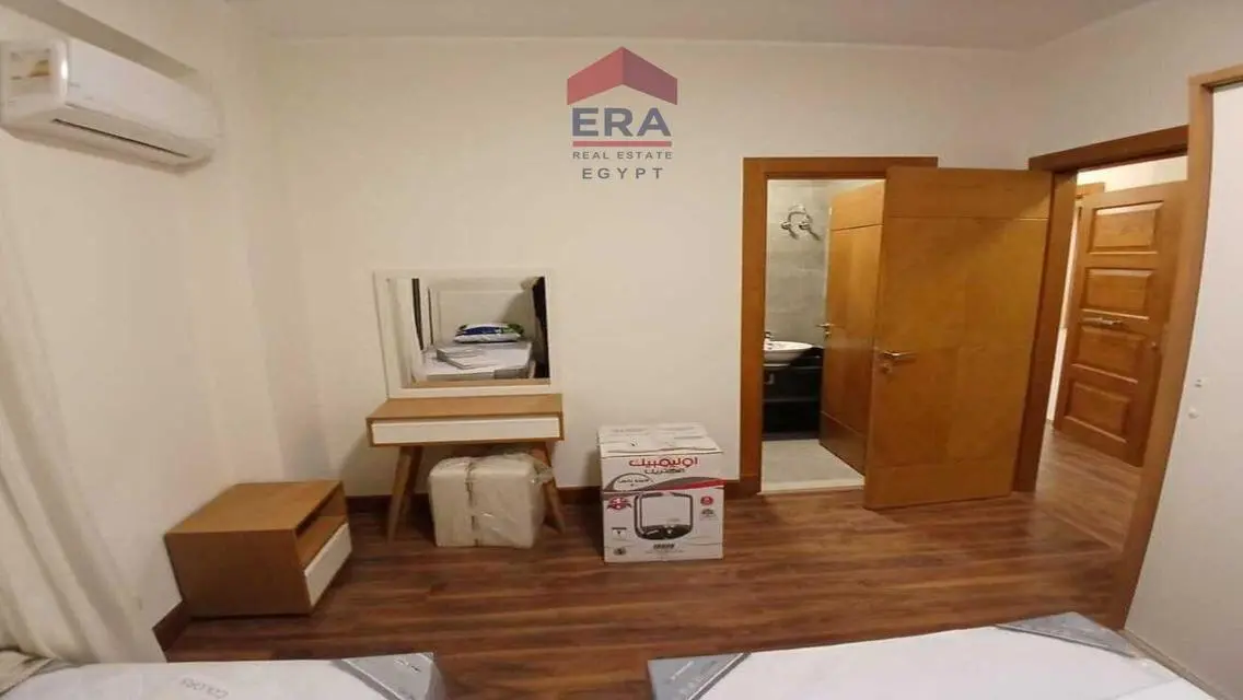 Spacious Apartment with Balcony and Covered Parking