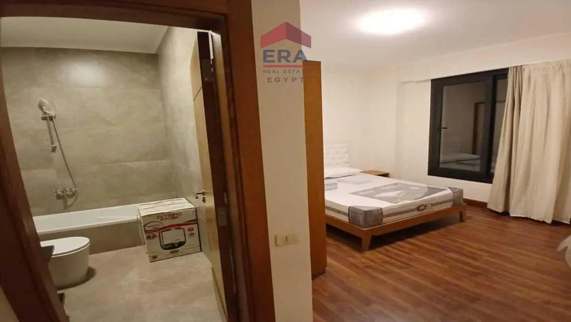 Spacious Apartment with Balcony and Covered Parking