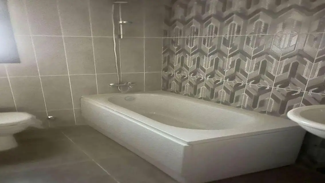 Luxury Apartment with Private Garden and Pool in Prime Location