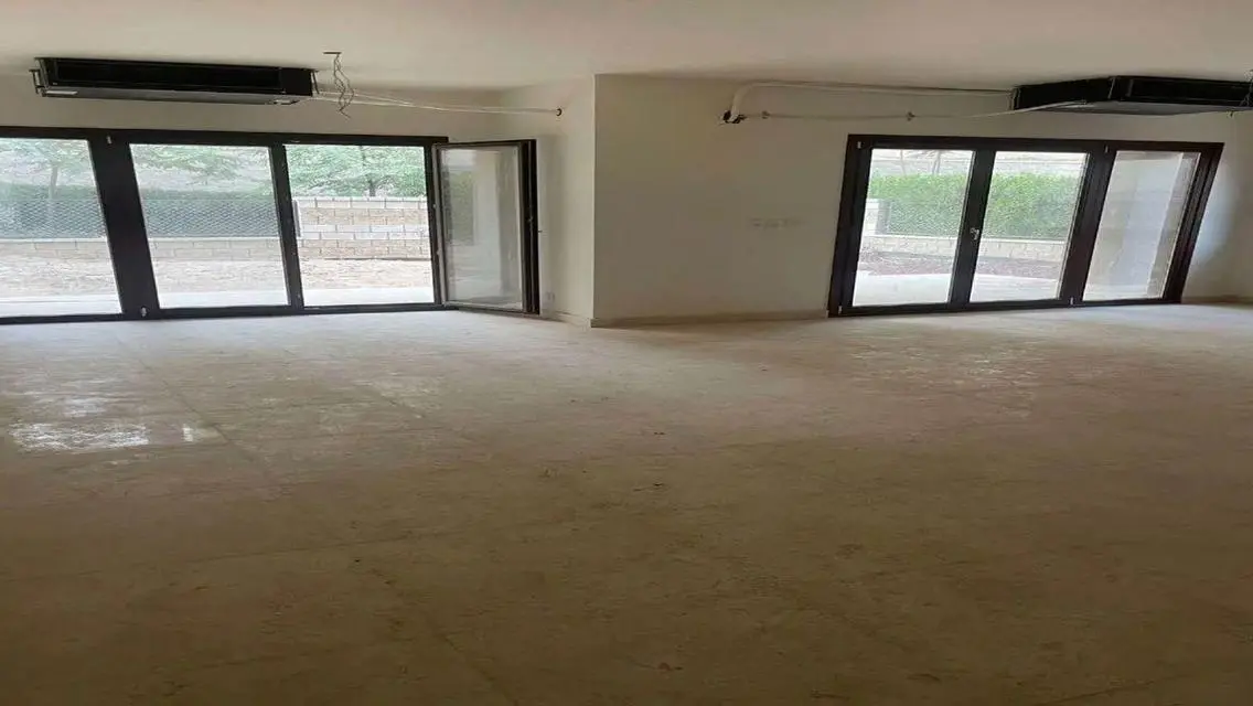 Luxury Apartment with Private Garden and Pool in Prime Location