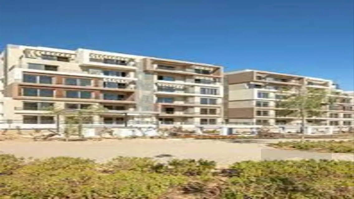 Luxury 4-Bedroom Apartment with Shared Pool and Private Garden