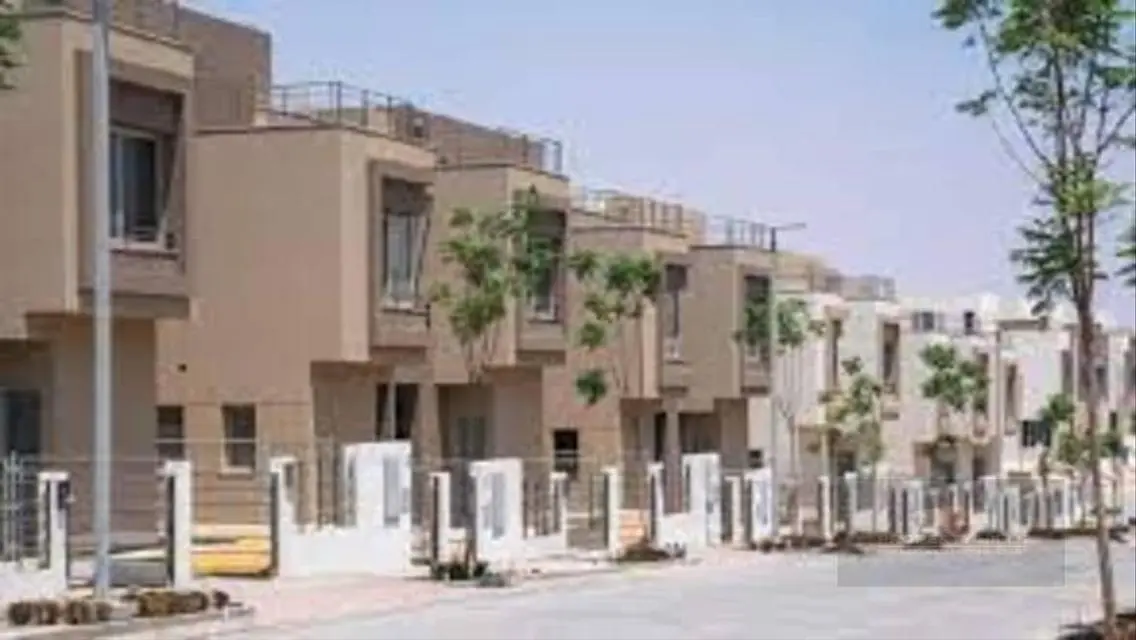 Luxury 4-Bedroom Apartment with Shared Pool and Private Garden