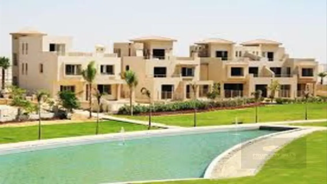 Luxury 4-Bedroom Apartment with Shared Pool and Private Garden
