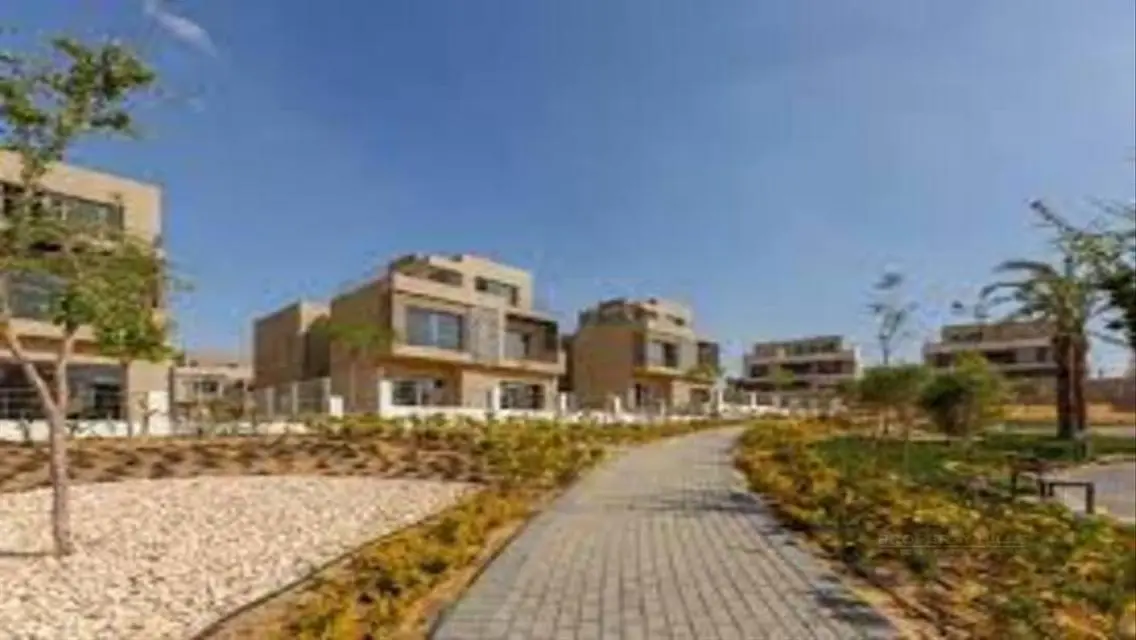 Luxury 4-Bedroom Apartment with Shared Pool and Private Garden