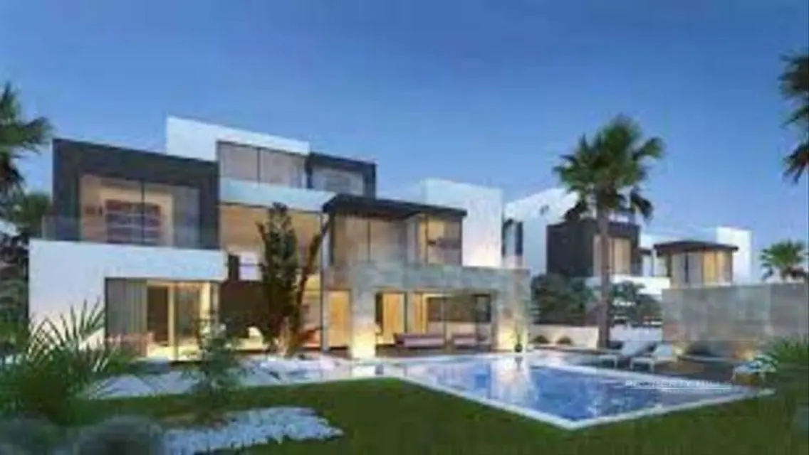 Luxury 4-Bedroom Apartment with Shared Pool and Private Garden