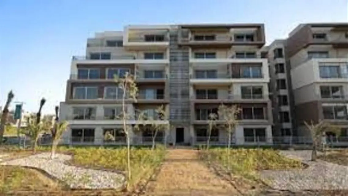 Luxury 4-Bedroom Apartment with Shared Pool and Private Garden