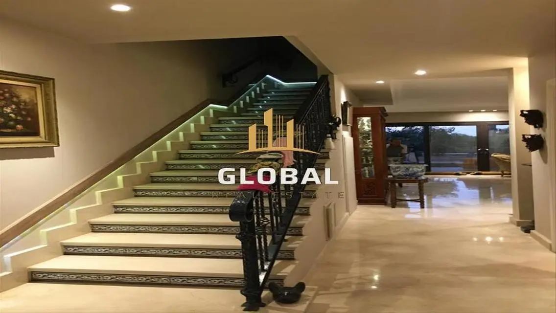 Luxury Villa for Sale at 65,000 EGP - Prime Location with Private Garden and Shared Pool
