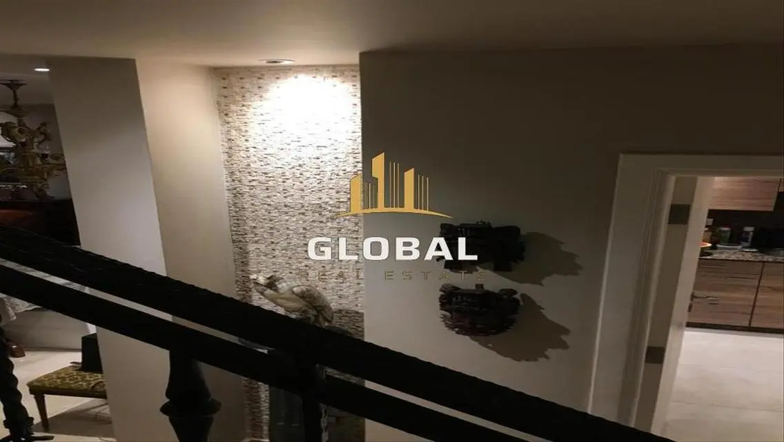 Luxury Villa for Sale at 65,000 EGP - Prime Location with Private Garden and Shared Pool