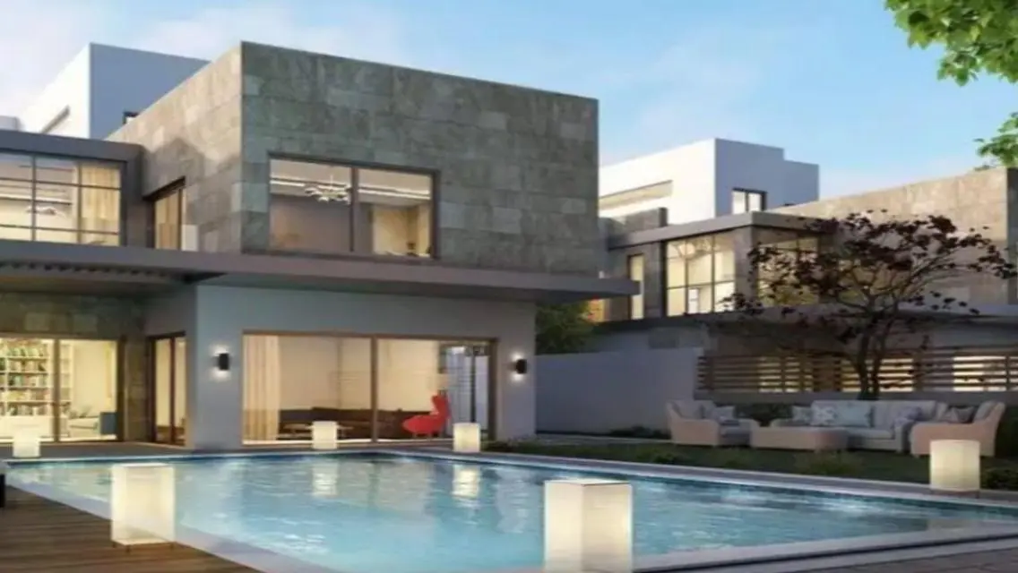 Luxury Apartment with Private Garden and Shared Pool for Sale