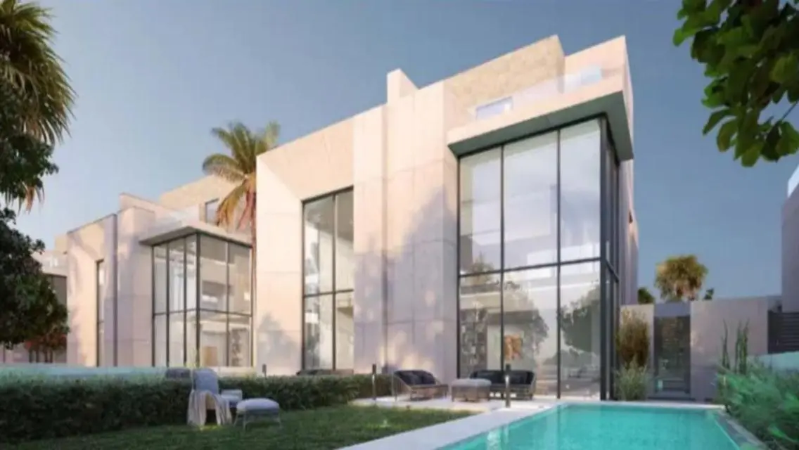Luxury Apartment with Private Garden and Shared Pool for Sale