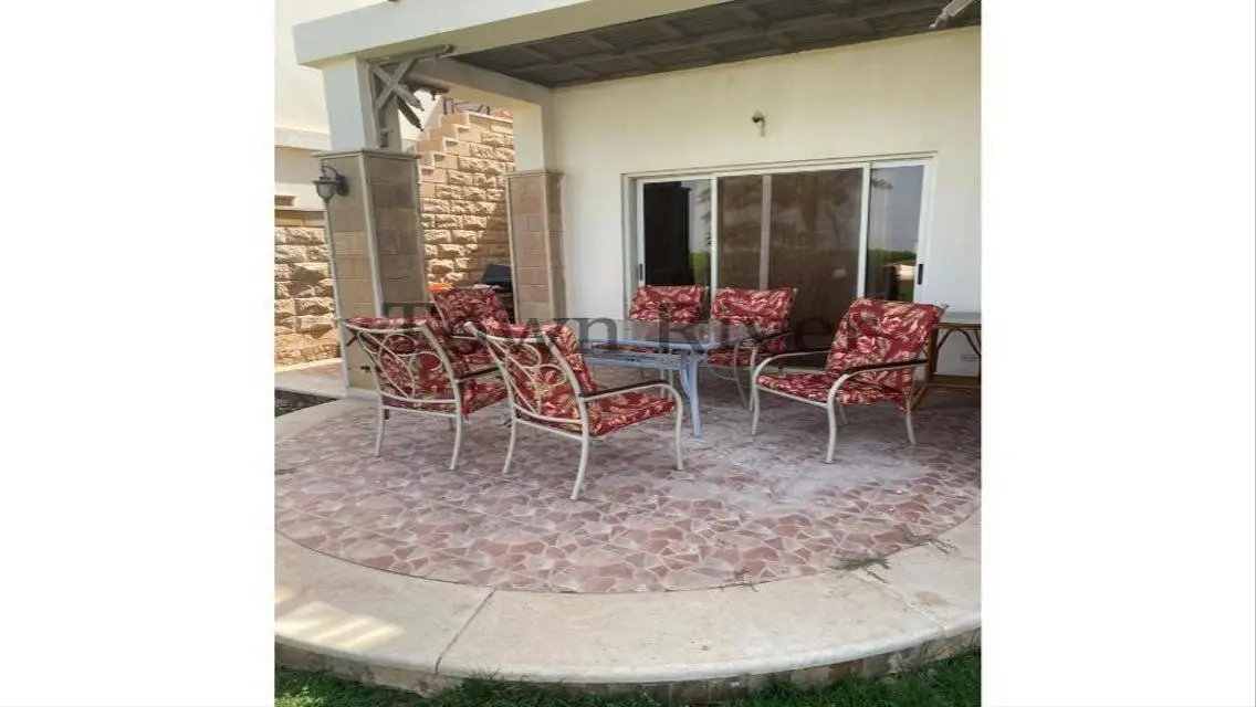 Stunning Villa with Private Garden and Community Pool for Sale